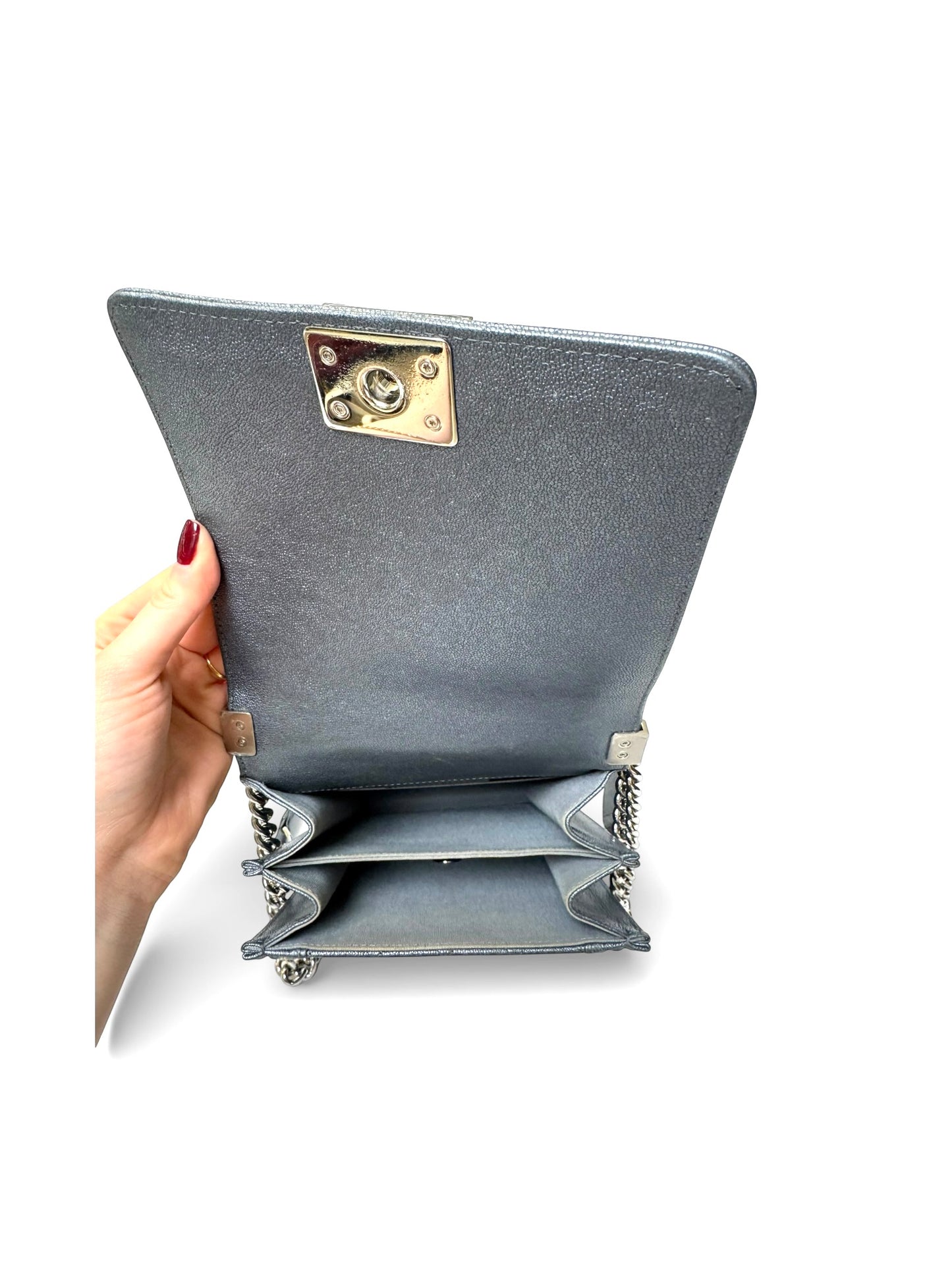 Chanel silver caviar North/West boy bag