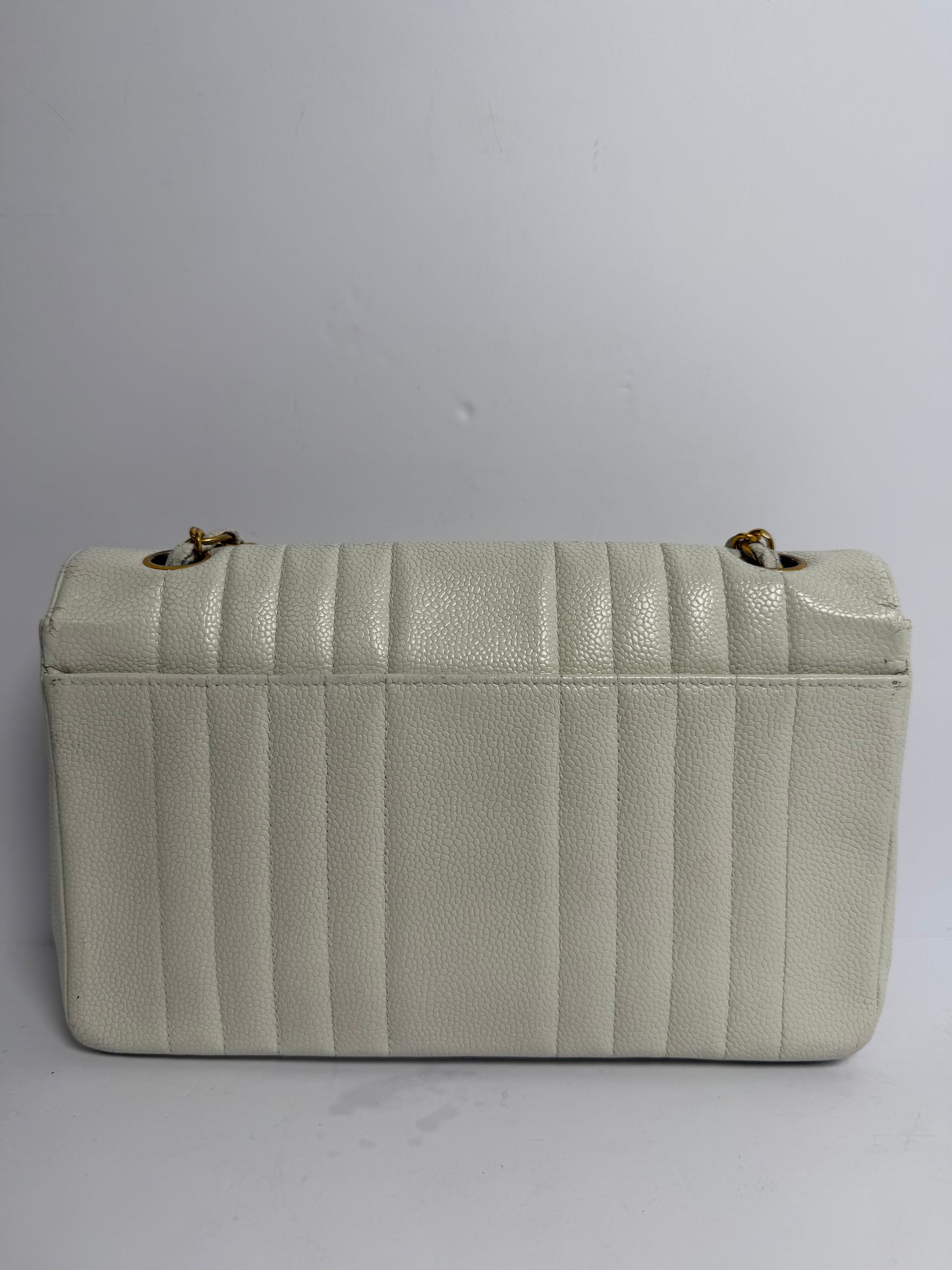 Chanel vertical caviar medium white