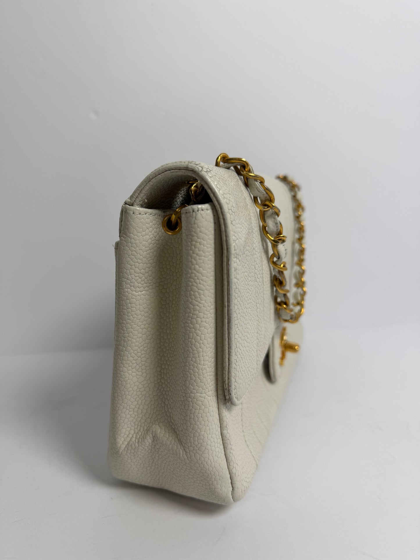 Chanel vertical caviar medium white
